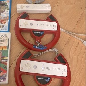 3 Wii Remotes + 2 Mario Cart Wii Wheels